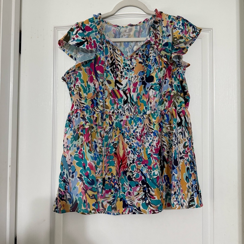 Abstract Print Tie V Neck Peplum Blouse